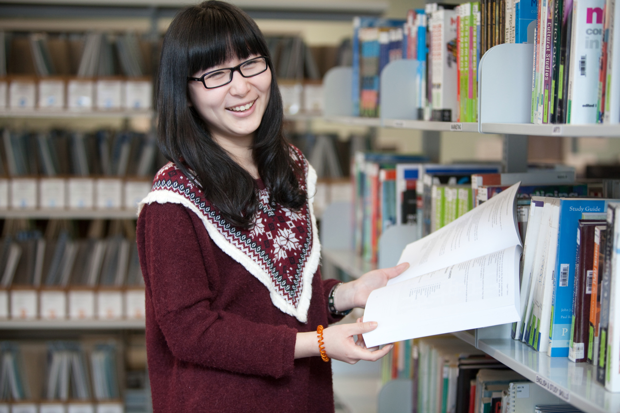 Education marketing photography of student in library